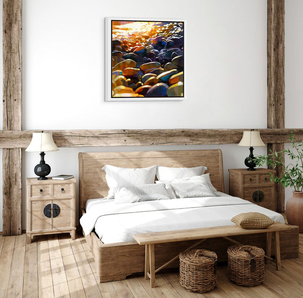 featuring a framed picture of colorful stones on the wall.